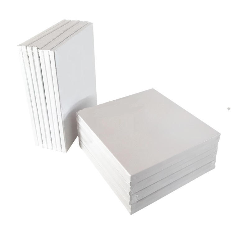 various sizes of artist painting stretched canvas