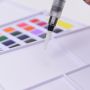 24 color solid watercolor with plastic box. Student level